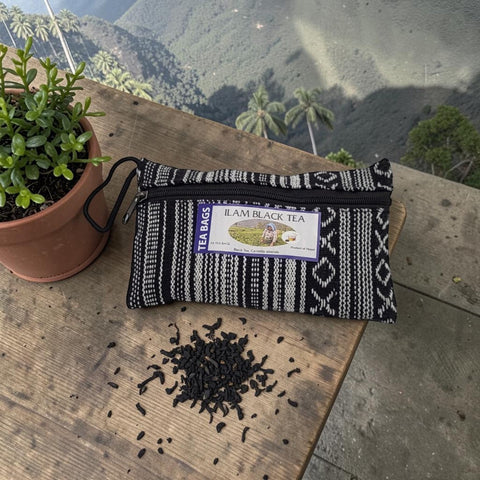 House of Nepal Ilam Black Tea 25 tea bags in a black and white woven pouch with a zipper and a loop.