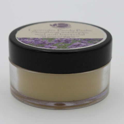 House of Nepal Lavender Body Balm in a clear jar with a black lid, featuring a label with lavender flowers and text.