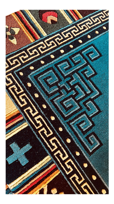 House of Nepal Nepalesischer Sanumaya Teppich 120x180cm, handgeknüpft aus tibetischer Schafwolle, mit türkisfarbenem Grund und geometrischem Muster.