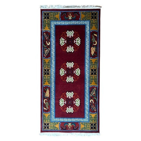 House of Nepal Nepalesischer Teppich 90x190cm, handgeknüpft aus tibetischer Schafwolle, mit roten Medaillons und geometrischem Rand.