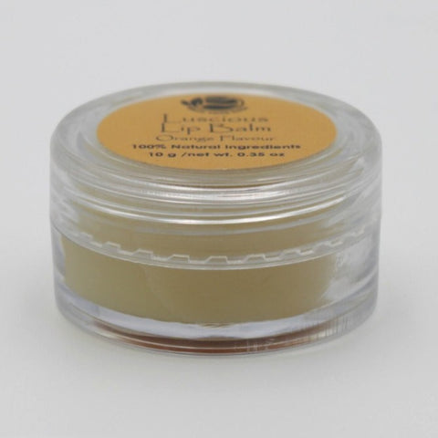 House of Nepal luscious orange flavour lip balm in a clear pot with a yellow label. 10g.