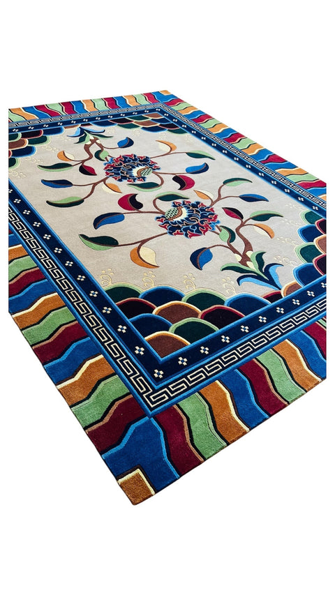 House of Nepal Nepalesischer Sonnenblume Teppich 200x250cm aus 100% tibetischer Schafwolle, handgeknüpft mit Blumenmotiv und geometrischem Rand.