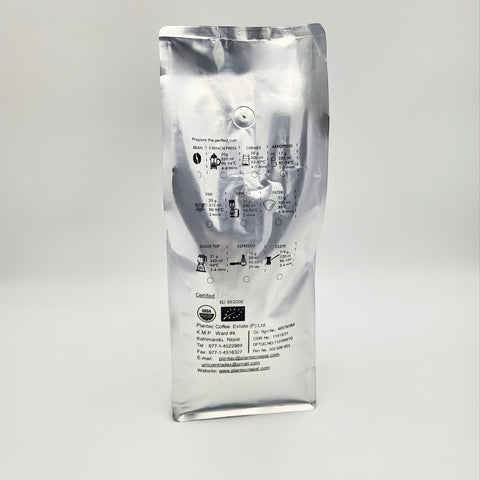 House of Nepal Jalpa Gold 1kg bag of certified organic Arabica coffee beans from Nepal, medium-dark roast.