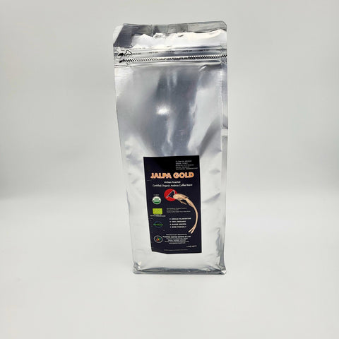 House of Nepal Jalpa Gold 1kg bag of certified organic Arabica coffee beans from Nepal, medium-dark roast with chocolate, caramel, and nut notes.