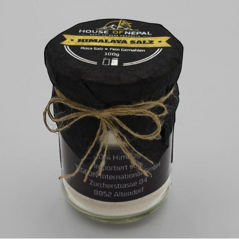 House of Nepal fine pink Himalayan salt in a glass jar, 100g, ideal for cooking and bathing.