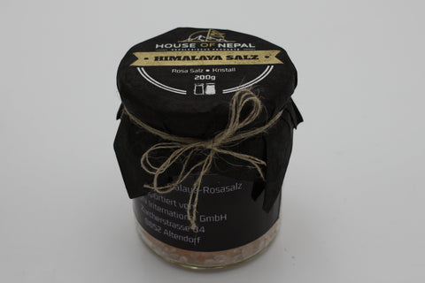 House of Nepal pink Himalayan salt crystals in a glass jar, 200g, coarse grain, ideal for cooking or baths.