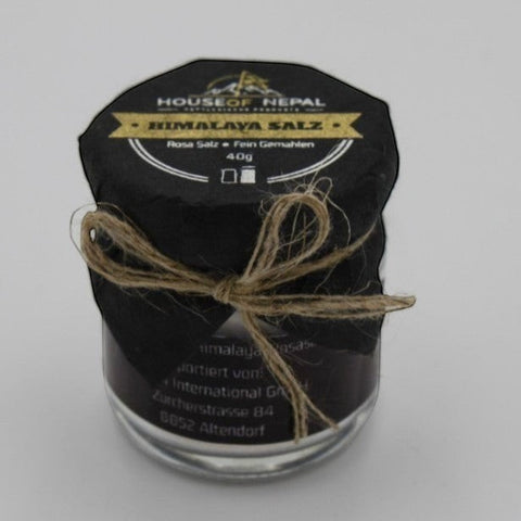 House of Nepal fine pink Himalayan salt in a glass jar, 40g, tied with twine.
