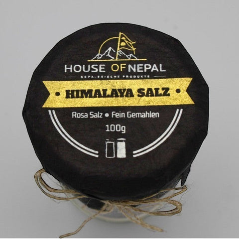House of Nepal fine ground pink Himalayan salt, 100g jar, ideal for cooking and bathing.