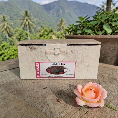 House of Nepal rose black tea in a handmade lokta paper box with 25 tea bags. Features Ilam black tea and rose petals.